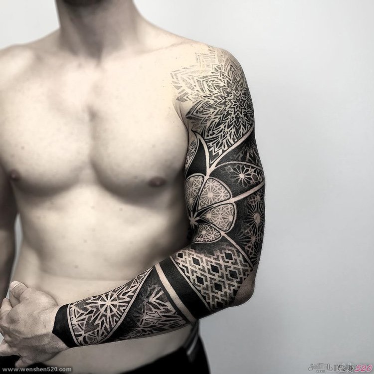guy's chest with arm tattoo